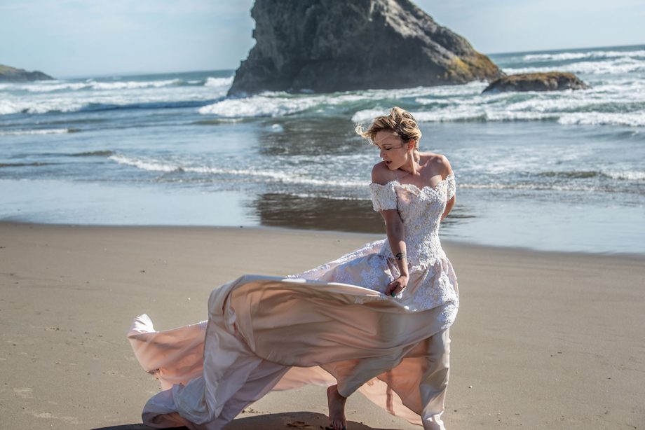 img="bride on the beach by Eric Wyatt Photography"