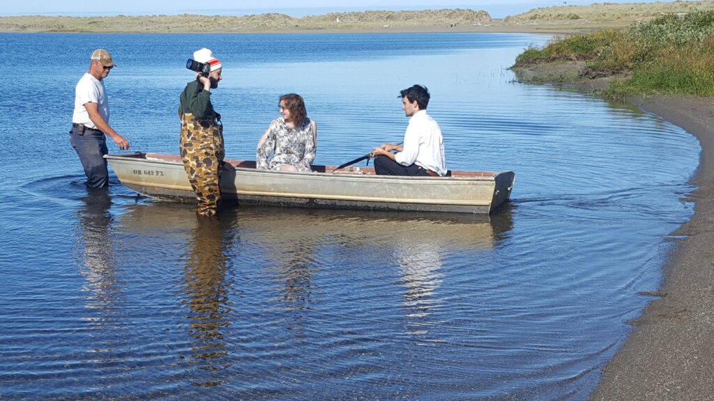 img="photography with Eric Wyatt in a boat on a lake"