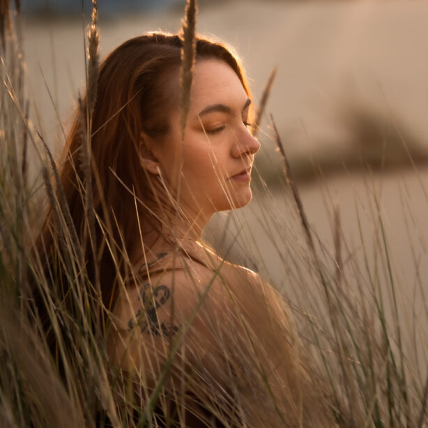 img="woman's elegant portrait outdoors"