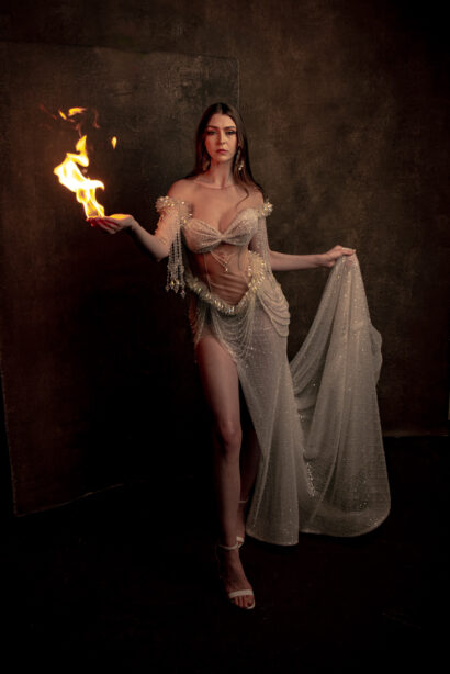 img="Women's photography with fire by Eric Wyatt"
