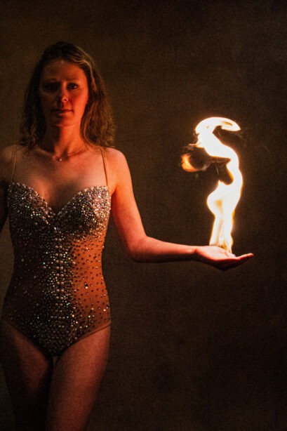 img="women's photography with fire by Eric Wyatt"