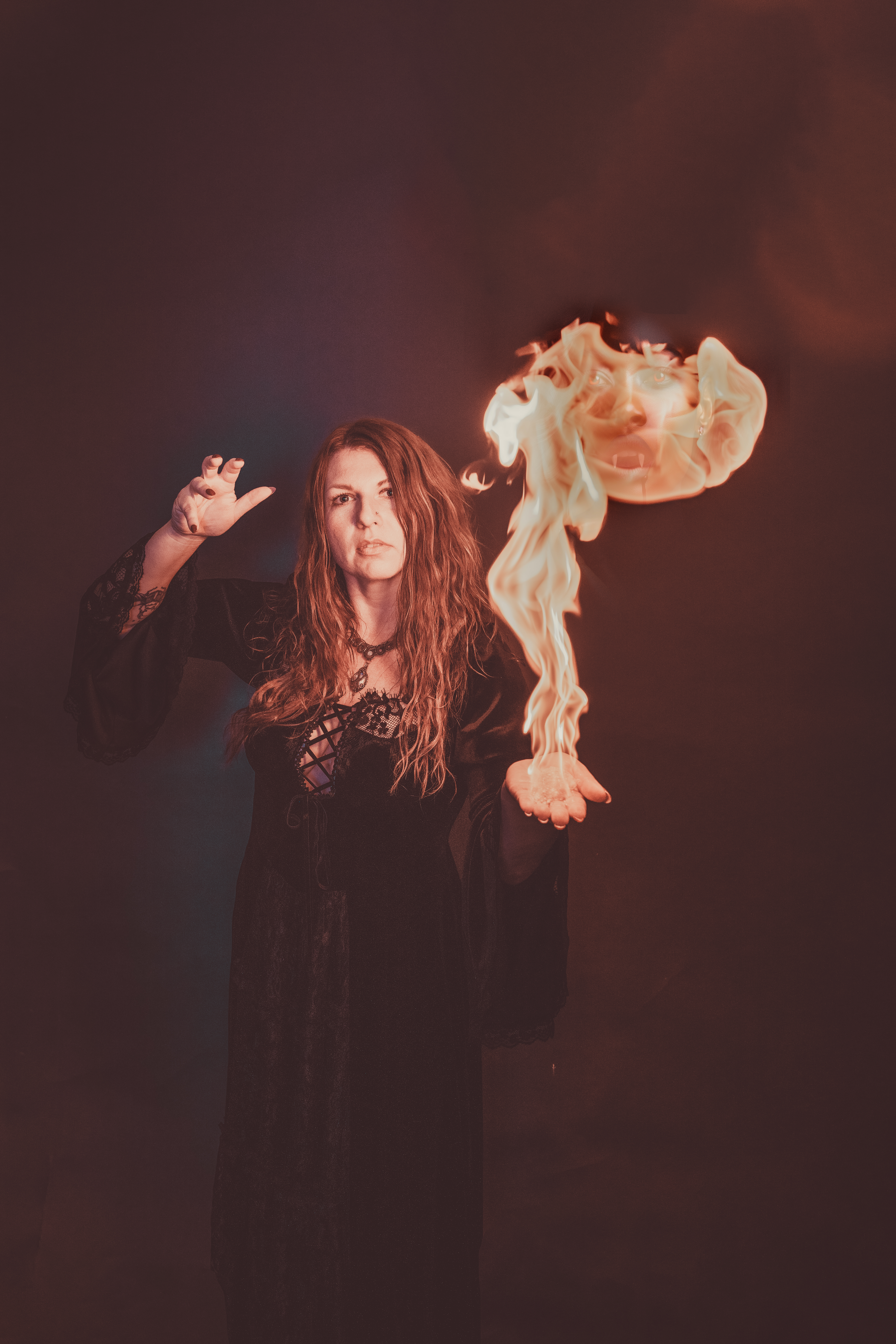 img="woman with fire by Eric Wyatt Photography"