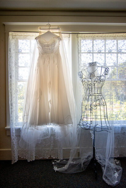 img="wedding gown and veil by Eric Wyatt Photography"