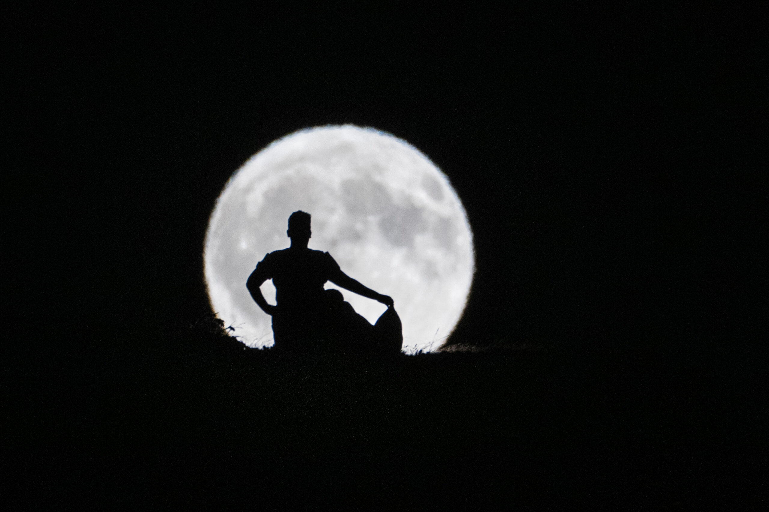 img="woman in the moon by Eric Wyatt Photography"