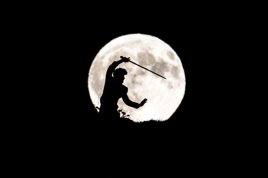 img="man holding rapier in the moon by Eric Wyatt Photography"